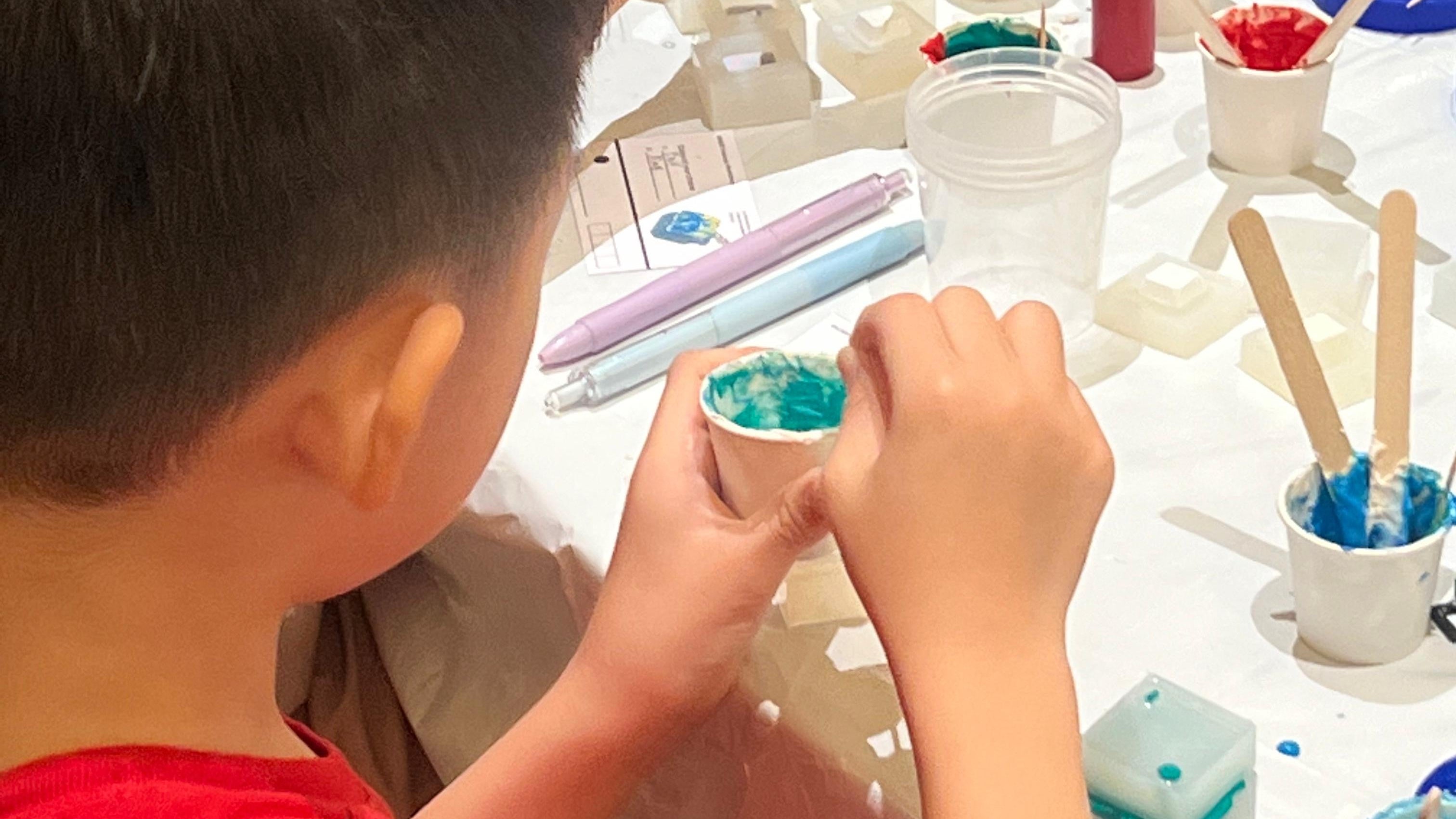 Corporate workshop at Little Nook with participants crafting personalized Jesmonite Keycaps.
